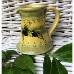 Provence Ceramic Creamer - Olives Light Yellow & Green
This hand made and hand painted ceramic creamer with an olives design will add a dash of Provence to your breakfast table. 

Height: 4"    

Product of France